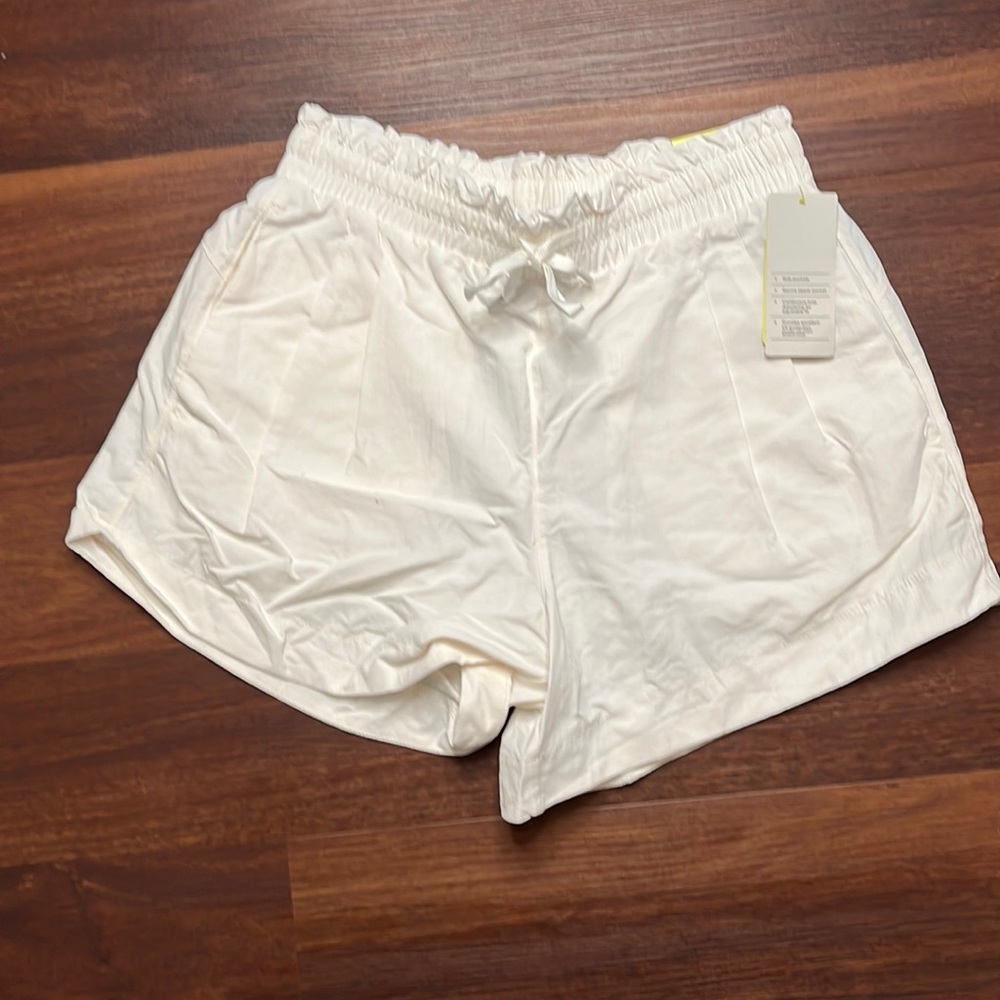 Woman’s All in motion High-rise resort shorts. Multiple sizes. Cream New w/ tags